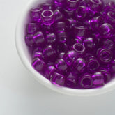 BD00066-02-roku-purple-barrel-transparent-pony-beads-6×9mm